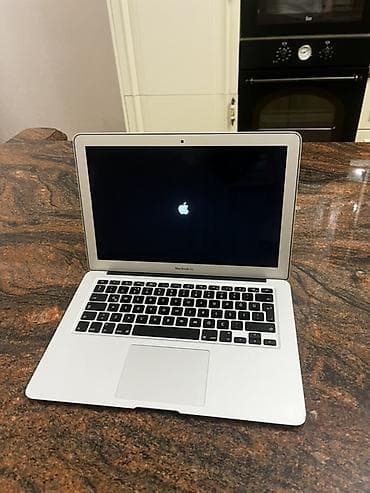 Apple MacBook Air (13") – gümüş rəng, alüminium gövdə. Xüsusiyyətlər