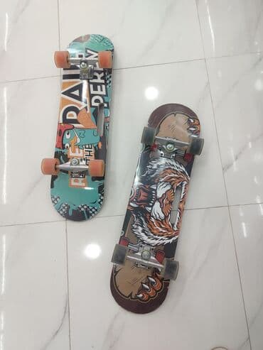Skateboard seti – rəngarəng və məşhur qrafik dizaynlarla iki lövhə