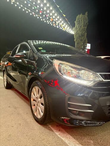 disk teker per page 40: Kia Rio sedan – qara rəng - Kuzov: 4 qapılı sedan, parlaq qara rəng — 1