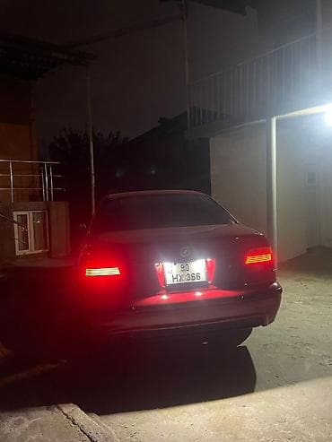 ceşka stop: BMW 5 Series sedan (E39) – qırmızı rəngdə, 4 qapılı. Xüsusiyyətlər və — 2