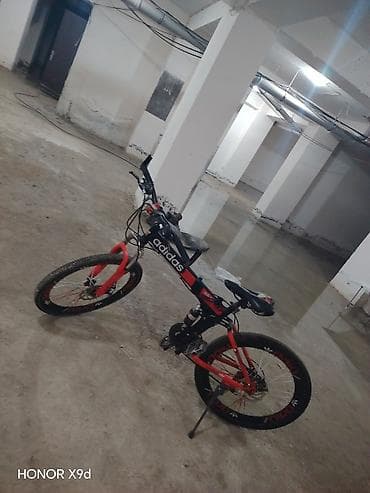 velosiped icarəsi: Qatlanan dağ velosipedi – Adidas Qırmızı qara rəng - Çərçivə — 1