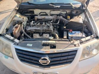 авто азербайджан: Nissan Sunny: 1.6 l | 2010 il Sedan — 5