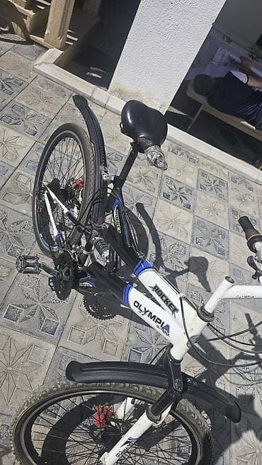 24 velosiped: İki ədəd dağ velosipedi 1) Olympia Rocket - Rəng: ağ-qara, mavi — 4