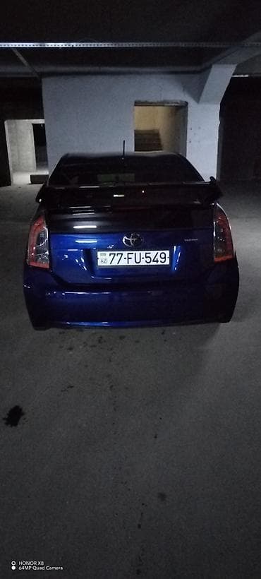 Toyota Prius (3-cü nəsil) – mavi rəng, hatchback gövdə. - Hibrid — 1