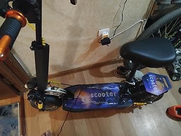 elektrik scooter: Elektrik skuter – oturacaqlı, kompakt və şəhər daxili hərəkət üçün — 2