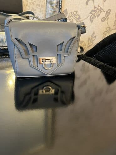 Çiyin çantası, İşlənmiş