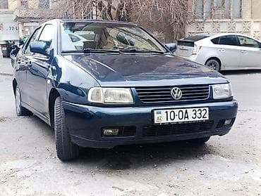 volkswagen polo 1: Volkswagen Polo sedan, tünd mavi rəng. - Yanacaq: benzin - Ötürmə — 1