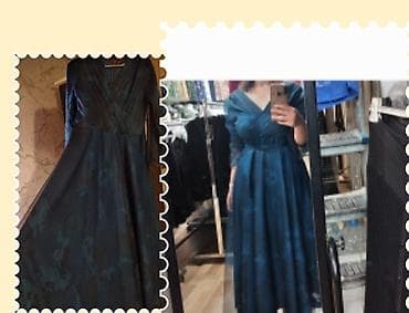 Zərif qəlibli, tünd mavi rəng çalarlarında uzun paltar. - Model