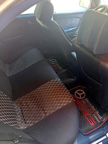 0pel astra 1.6: Mercedes-Benz C 180: 1.8 l | 1995 il Sedan — 5