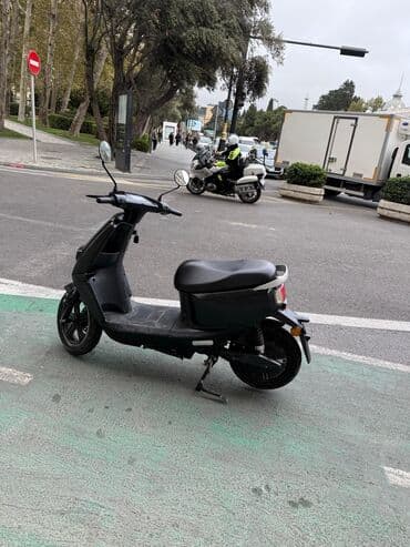 электро мотоцикл: Elektrik skuter – şəhər içi sürüş üçün ideal, kompakt və səssiz. 2000w — 6
