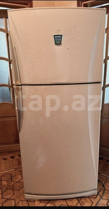 Sharp iki qapılı soyuducu - Üstdə dondurucu, altda əsas soyuducu