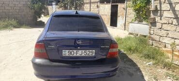 Su nəqliyyatı: Opel Vectra sedan – mavi rəng - Kuzov: 4 qapılı sedan, göy/mavi rəng — 4