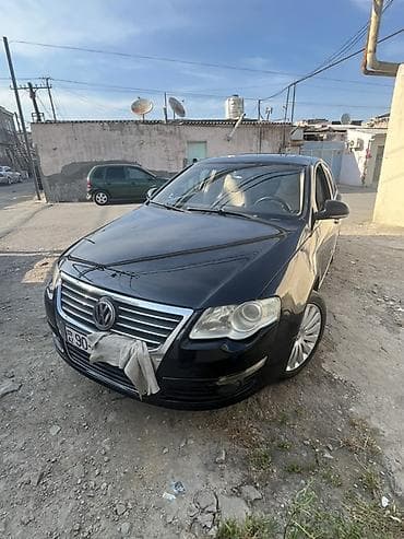 Volkswagen Passat: 2 л | 2006 г. Седан