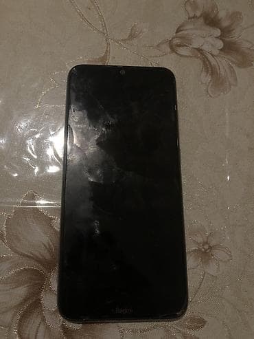 ikinci el kamera: Məhsul: Xiaomi Redmi smartfon Xüsusiyyətlər: - Arxa paneldə “Redmi” — 3