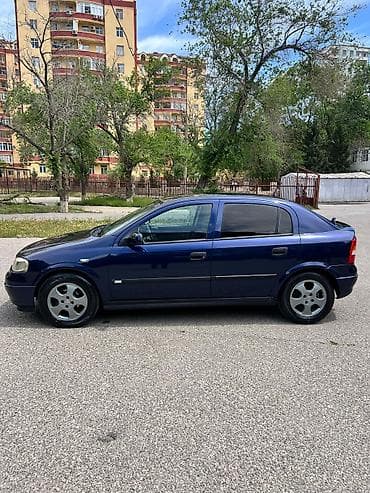 dt 75 traktor satisi: Opel Astra: 1.6 l | Sedan — 3