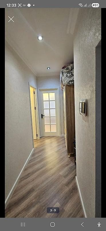 yeni yaşma: Yeni tikili binada 2 otaqlı mənzil (studia tipli zal + ayrıca yataq — 6