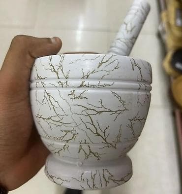 Daş və ya kompozit materialdan hazırlanmış əl dəyirmanı – havan və