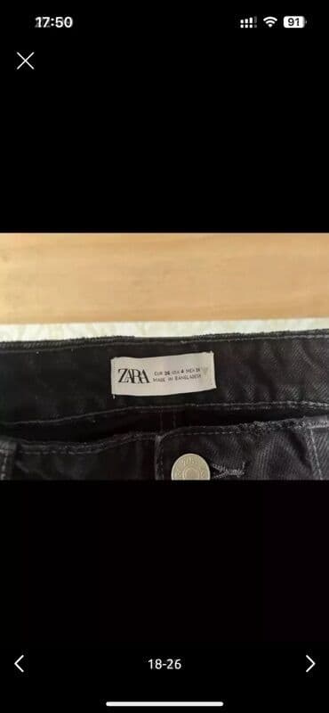 zeynep bastik baku: Zara Qara rəngli, yırtıq detallı cins şalvar. Dizlərdə və digər — 6