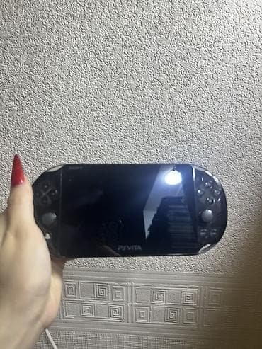 psp 5: Sony PS Vita portativ oyun konsolu Xüsusiyyətlər: - 5 düym OLED — 1