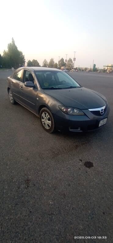 hediye qutusu: Mazda 3: 1.6 l | 2008 il Sedan — 1
