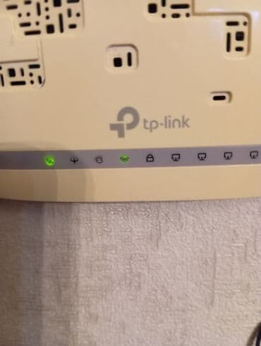 ruter modem: TP-Link şirkətinin istehsalı olan, iki antenli ağ ruter. Evdə və ya — 6
