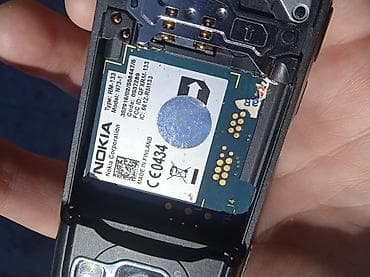 телефон fly ff247 black: Nokia N73, цвет - Черный, Кнопочный — 8