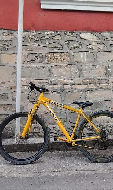 Sarı rəngli dağ velosipedi – Shimano transmissiya - Rəng: parlaq sarı