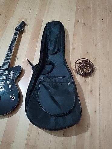 İdman və hobbi: Salam Elektro gitara satilir problem fln yoxdur islekdir toy — 6