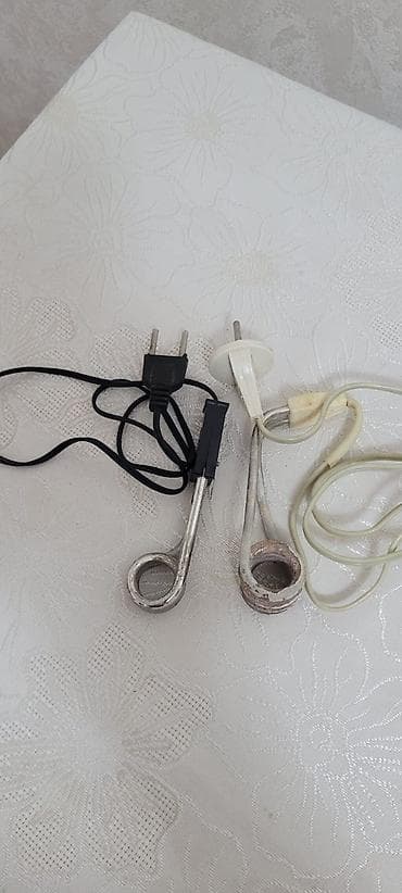 Mini su qizdirici cay qaynatmaq ucun caskayada yerlesir — 1