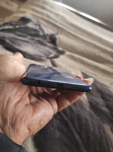 komputer korpusu: Samsung A10e, rəng - Mavi, Barmaq izi — 9