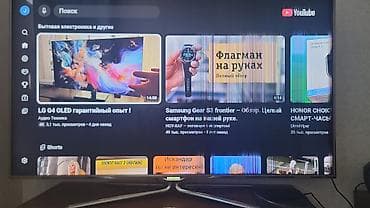 smart tv samsung: Samsung Smart TV – YouTube tətbiqi göstərilən şəkillərdə. Ekranın sağ — 2