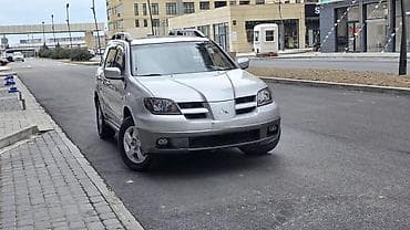 niva satilir: Mitsubishi Outlander: 2.4 l | 2003 il Krossover — 7