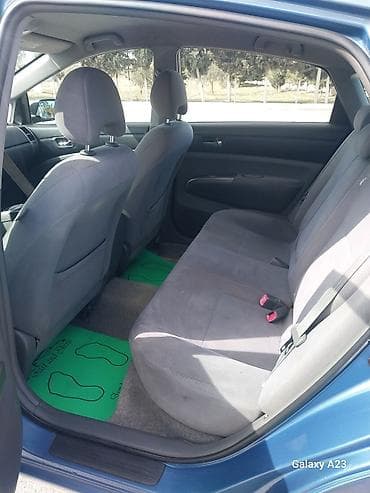 Avtomobil alışı: Toyota Prius (2-ci nəsil) hibrid sedan - Rəng: mavi - Kuzov: liftbek — 3
