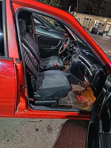 winda teker: Opel Astra: 1.6 l | 1996 il 253555 km Sedan — 8
