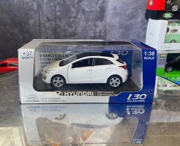 maşın modeli: Коллекционная модель Hyundai i30 5 door white 2012 Pino B&D Scale — 1