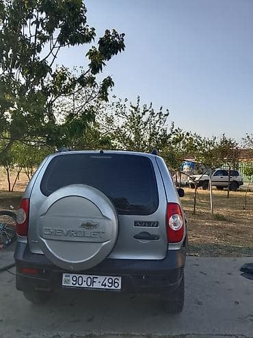 panel ortuyu: Chevrolet Niva: 1.7 l | 2012 il 213000 km Krossover — 8