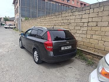pulsuz ehtiyacı olan: Kia Cee’d SW (universal) – tünd boz rəng, 5 qapılı, dam relsləri ilə — 4