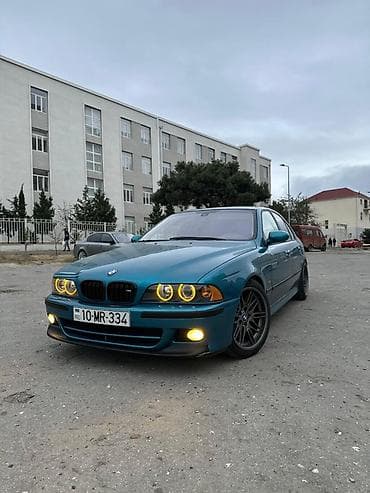 teker cixardan: BMW 5 series: 2.5 l | 1996 il Sedan — 5