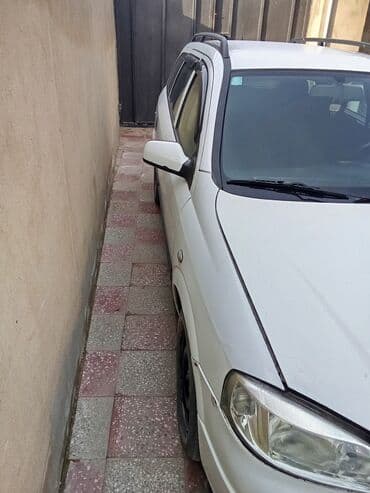 yuk masini arendaya verilir: Opel Astra Caravan (universal kuzov ili 2001 mexanika 1.7isuzi motor — 4