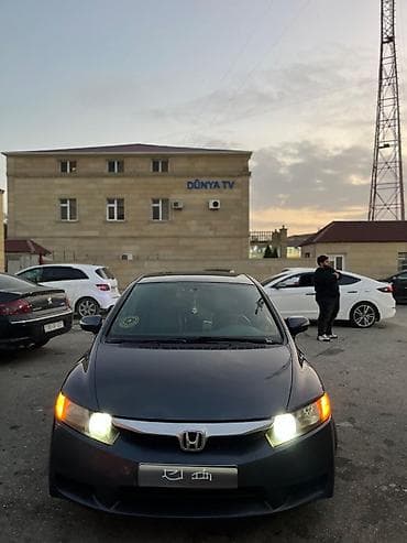 hyundai accent 2008: Honda Civic: 1.3 l | 2010 il Sedan — 2