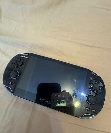 bluetooth qulaqciq: Sony PlayStation Vita (PS Vita) əl konsolu Xüsusiyyətlər: - Model — 1
