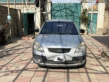 10 lt 663: Kia Rio: 1.5 l | 2008 il Hetçbek — 1