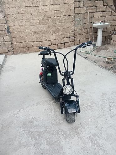 on lip: Elektrikli skuter satılır. Qara rəngli, oturacaqlı və kompakt dizayna — 3