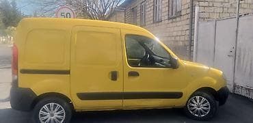 masin qaz: Renault Kangoo sarı rəngli yük/furqon avtomobili. Xüsusiyyətlər: - — 2