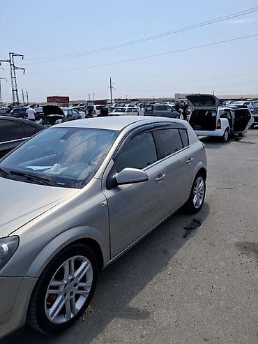 masın satısı: Opel Astra H – 5 qapılı hetçbek Xüsusiyyətlər: - Kuzov: 5 qapılı — 4