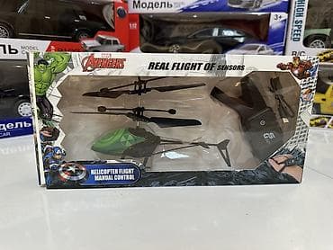 oyuncaq helikopter: Qolbaqla hərəkət edən sensorlu vertalyotlar Cəmi15 azn Metrolara — 2