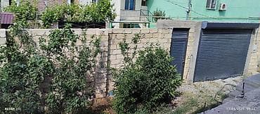 binede ev: - İki mərtəbəli daş tikili ev - Fasadda kəsme daş (kubik) ilə hörgü — 2