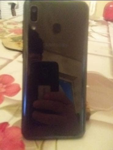 Техника для кухни: Samsung Galaxy A20, цвет - Черный, Отпечаток пальца — 2