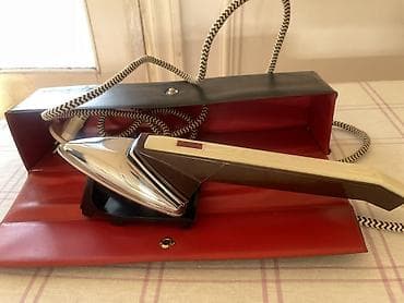 Retro elektrik ütüsü - Dizayn: Uzun saplı, xrom parlaq altlıq və