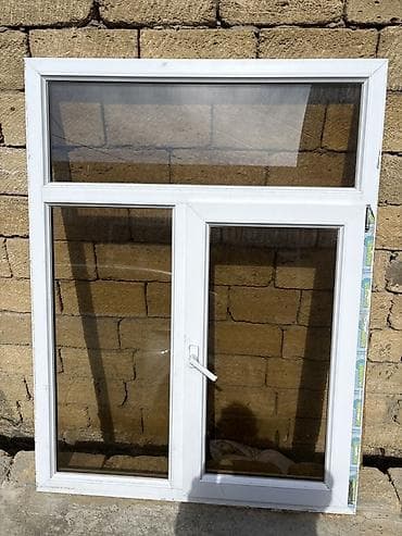 plastik cən: Ağ rəngli plastik (PVC) pəncərə bloku. Xüsusiyyətlər: - Üst hissədə — 1